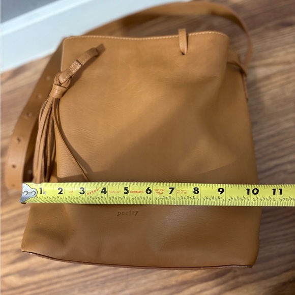 - [ ] Poetry Tan Leather Bucket Bag with Tassels - Picture 10 of 10
